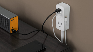 Illustration for article titled A Tiny Mountable Power Bar Fixes Your Outlet's Most Annoying Flaws
